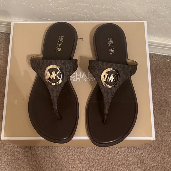 Michael Kors Shoes - Michael Kors Dark Brown Sandals with Gold Emblem